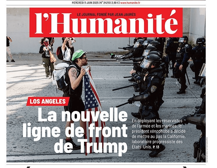 Front cover image from l'Humanité, a Paris newspaper. Shows a confrontation on a highway between black-clad soldiers and American civilians, one of them holding an American flag.